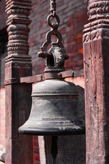 Obraz premium background of bronze temple bell with scriptures in it,