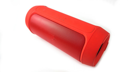 Mini bluetooth red speaker isolated on over white background.