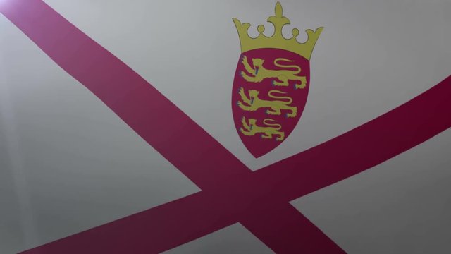 Flag of Jersey waving on flagpole in the wind, national symbol of freedom