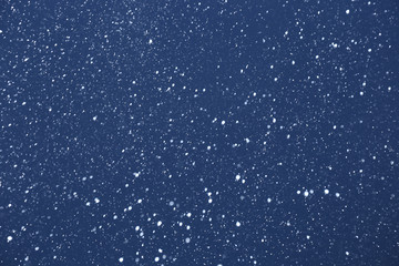 snow on a black background