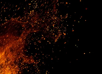 Photo sur Aluminium Flamme flammes de feu avec des étincelles sur fond noir