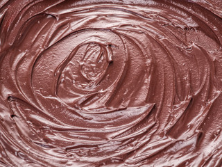 Melted chocolate or chocolate glaze.