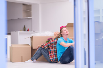 young couple moving  in new house