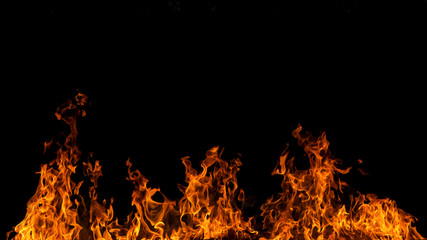 Fototapeta na wymiar Blaze fire flame on black background