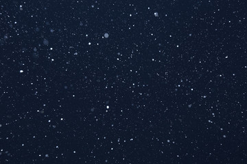 snow on a black background