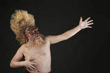 adult man with a beard and a high mohawk