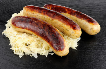 Fried Bratwurst Sausages And Sauerkraut