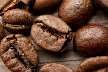 coffee beans on wooden board, closeup
