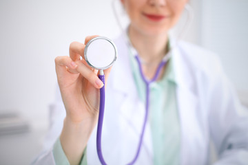 Doctor with a stethoscope in the hands