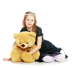 Girl with a Teddy bear.