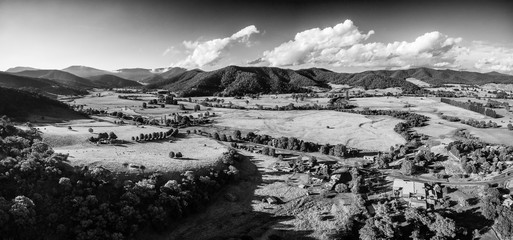 Black and white aerial landscape of Australian countryside at sunset.