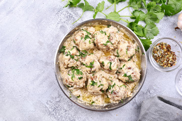 Meatballs with white sauce, top view