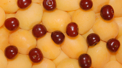TOP VIEW: Ripe apricots and cherries