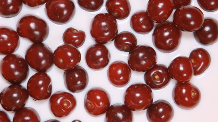 TOP VIEW: Milk with a cherries