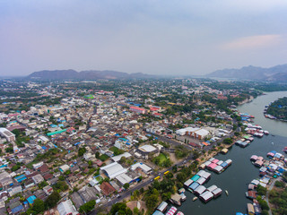 Fototapeta na wymiar Aerial view of floating house on mount of river