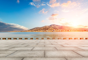 Square and hills under the blue sky