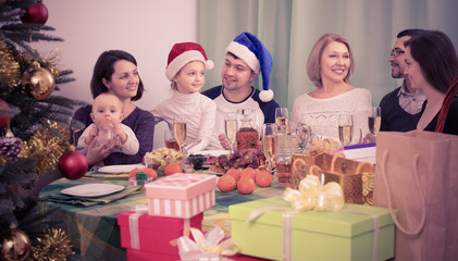 Fototapeta na wymiar Big family gathering together for Christmas at home