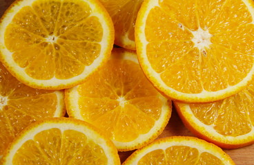 Background of sliced  juicy oranges fruit