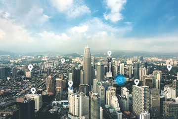 Fototapeta premium Searching location on map and pin above blue tone city scape and network connection, internet of things, satellite navigation system concept