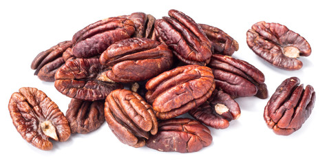 roasted pecan fruits on white, (large depth of field, taken with tilt shift lens)