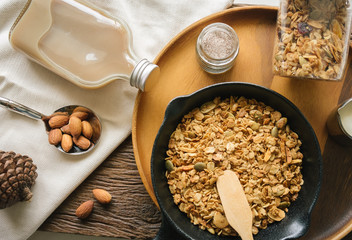 Fresh and Healthy breakfast with the grain and yogurt on the black pan close up shoot. minimal japanese style