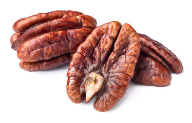 roasted pecan fruits on white, (large depth of field, taken with tilt shift lens)