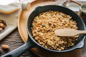 Fresh and Healthy breakfast with the grain and yogurt on the black pan close up shoot. minimal japanese style