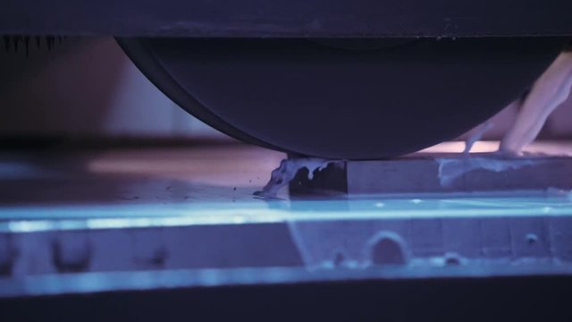 CNC machine tool, grinding of metal products. Сlose-up. 4k footage. Automatic production process. 

