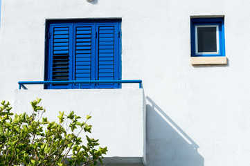 Balcony with colored shutters