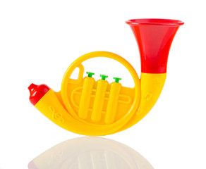 yellow toy pipe isolated on white