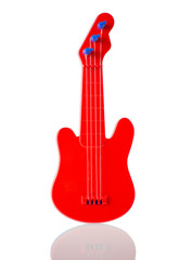 red toy guitar isolated on white