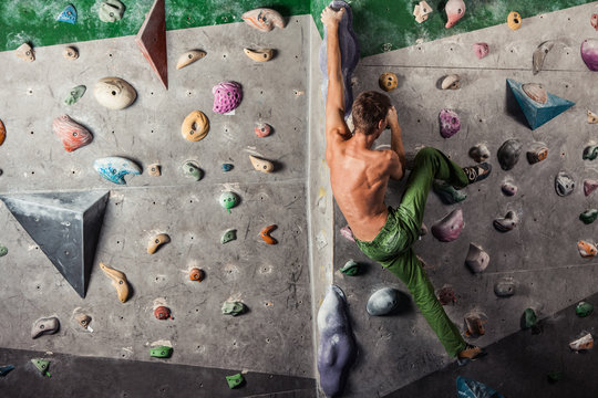 man exercise bouldering and climbing indoor