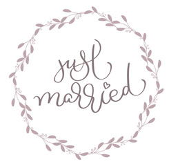 Just Married text in leaves round frame. Hand drawn Calligraphy lettering Vector illustration EPS10