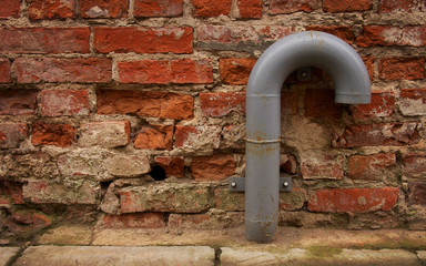 Red brick wall & pipe