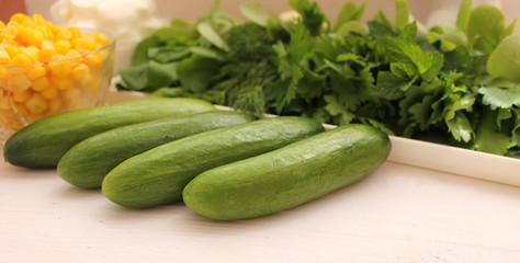 Fresh green cucumbers prepared for vegetable salad