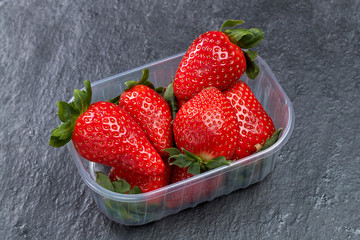 Fresh red strewberry in plastic box