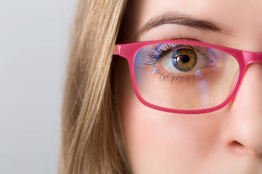 Closeup Of And Eye Of Blonde Woman With Pink Glasses