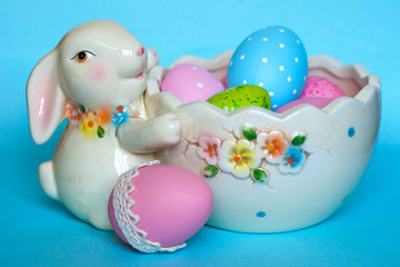 easter bunny with basket and eggs