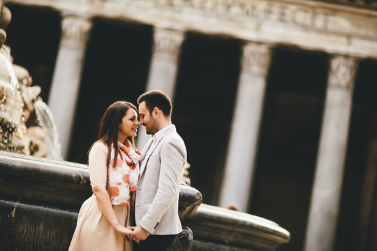 Loving couple in front of the Pantheon in Rome