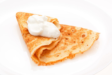 Serving pancakes on the plate.