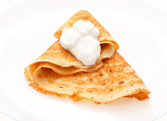 Serving pancakes on the plate.