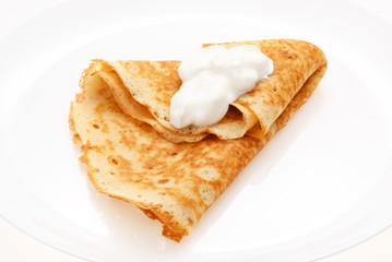 Serving pancakes on the plate.