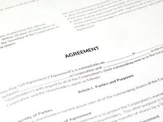 Fototapeta premium Contract papers on the table. The documents is ready to be filled out.