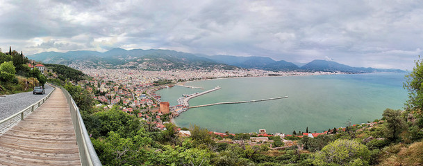 Panorama of the resort city of Alanya in Turkey with a view of the sea, the port, the fortress and the tower
