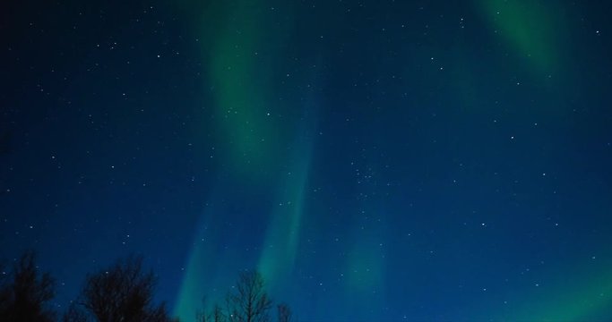 Northern Lights, polar light or Aurora Borealis in the night sky timelapse