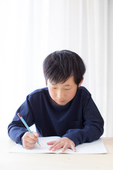 boy studying or doing home work