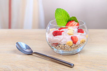 yogurt with mint muesli and sliced fresh fruit