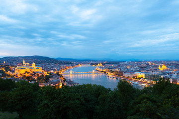 Fototapeta premium Evening panorama of Budapes from Gellert Hill with a beautiful sunset sky