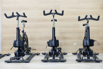 Unterior of a fitness hall with sport bikes