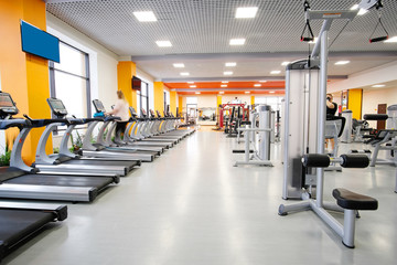Fototapeta na wymiar Interior of treadmills in a fitness hall